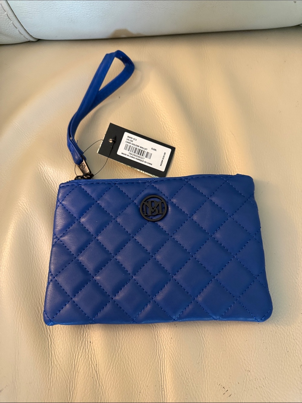 Badgley Mischka Quilted Royal Blue Wristlet with Black Logo